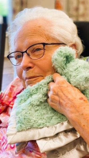 Carma with plush lovey