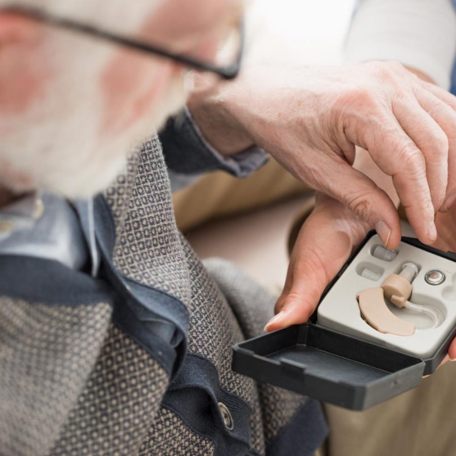 high-angle-view-of-elderly-man-looking-at-box-with-2024-11-17-10-31-42-utc